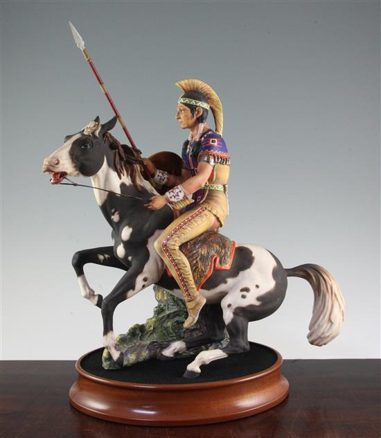 A Royal Doulton group Indian Brave, model HN2376, 44cm to tip of spear,